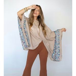 Three bird nest poncho- BLACK